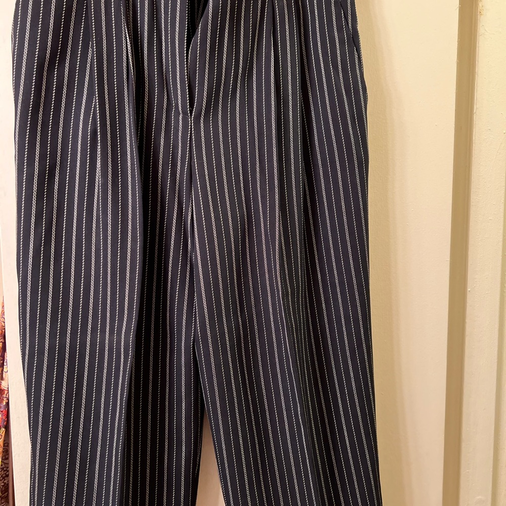 Elegant, classy strip pants.